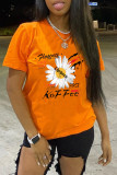 オレンジファッションカジュアルプリントベーシックOネックTシャツ