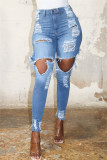 Jeans skinny a vita alta strappati casual alla moda blu