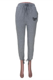 Pantalones casuales de cintura alta con estampado de letras informales grises