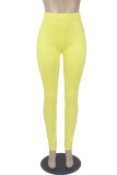 Pantalones de lápiz de cintura alta flacos básicos con estampado casual de moda amarillo