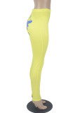 Pantalones de lápiz de cintura alta flacos básicos con estampado casual de moda amarillo