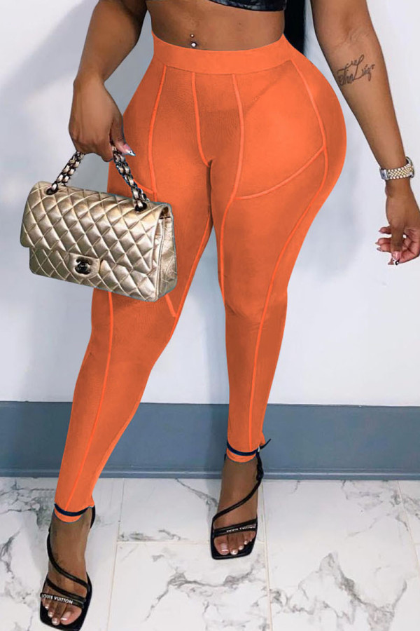 オレンジファッションセクシーカジュアルソリッドシースルースキニーハイウエストペンシルパンツ