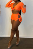 Bandage solide sexy à la mode orange évidé col en V à manches longues deux pièces