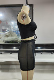Vendaje sólido sexy de moda negra ahuecado con cuello en V transparente sin mangas de dos piezas