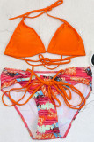 オレンジ色のファッションセクシーなプリント包帯くり抜かれた背中の開いた水着（パディング付き）