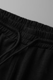 Pantaloni a tinta unita a matita a vita alta regolari in patchwork scavato solido nero casual da strada
