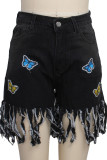 Pantalones cortos de mezclilla regulares de cintura alta con retales de borlas bordadas casuales de moda azul oscuro