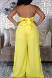 Yellow Fashion Casual Solid Bandage Patchwork Backless Halter Regular Jumpsuits