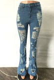 The cowboy blue Jeans de mezclilla regulares de cintura alta con retazos rasgados sólidos casuales de moda azul