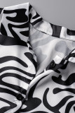 黒と白のカジュ​​アルプリントパッチワークバックルターンダウンカラー半袖ツーピース