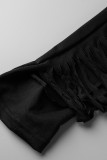 Schwarzer, sexy, fester, ausgehöhlter Patchwork-Overall mit O-Ausschnitt