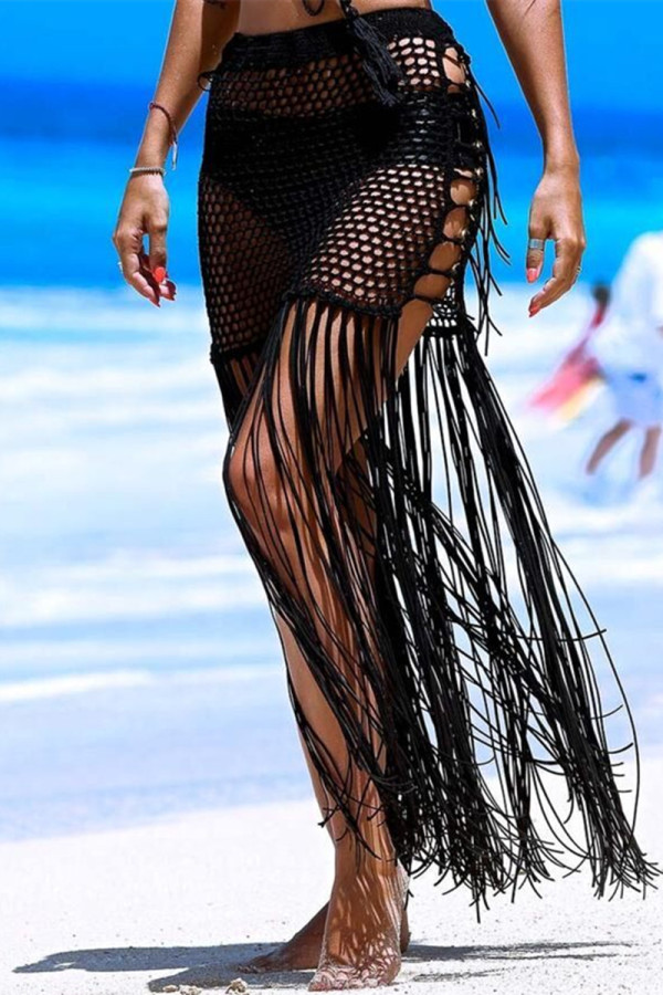 Falda moda sexy borla sólida ahuecada flaca cintura alta negro