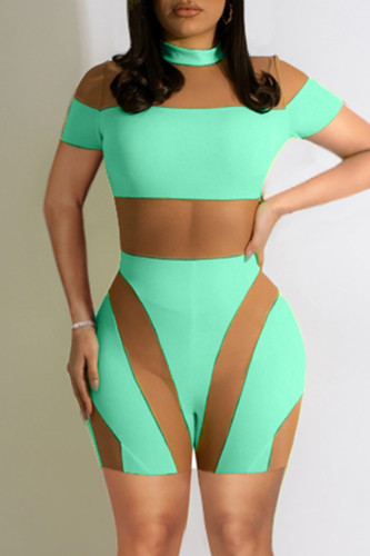 Light Green Fashion Sexy Patchwork See-through O Neck Skinny Jumpsuits