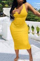 黄色のセクシーなソリッドパッチワークスパゲッティストラップワンステップスカートドレス