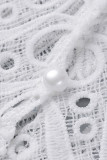 Magliette asimmetriche con fibbia scavata in tinta unita sexy di moda bianca