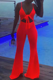 Tangerine Red Sexy Casual Solid Bandage Uitgeholde Backless Spaghetti Band Skinny Jumpsuits