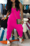 ピンクのファッションカジュアルソリッドバックレススパゲッティストラップレギュラージャンプスーツ