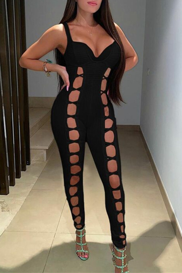 Zwarte mode sexy effen uitgeholde rugloze skinny jumpsuits met spaghettibandjes