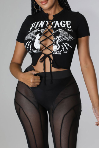 T-shirts noirs sexy à imprimé bandage décontracté à col rond évidé