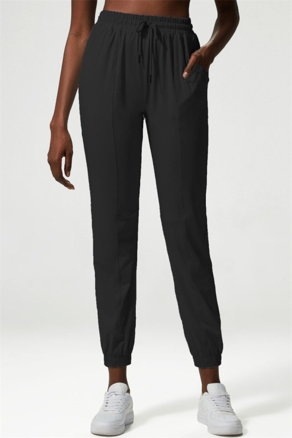 Schwarze, lässige Sportswear-Hose mit festem Patchwork und normaler hoher Taille