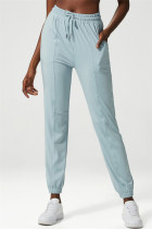 Hellblaue, lässige Sportkleidung, einfarbige Patchwork-Hose mit normaler hoher Taille