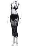 Zwarte sexy effen bandage patchwork doorschijnende rugloze halterjurk jurken