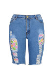 Blauwe mode casual jeans met gescheurde patchwork en grote maten