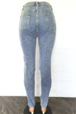 Blauwe mode casual effen bandage uitgeholde hoge taille skinny denim jeans