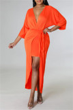 オレンジファッションカジュアルソリッドパッチワークVネックイレギュラードレス