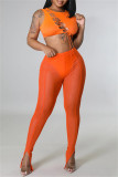 Pantalones de cintura alta flacos con abertura transparente de patchwork sólido casual sexy naranja