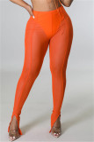 Оранжевые сексуальные повседневные однотонные лоскутные прозрачные узкие брюки с высокой талией и разрезом