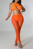 Pantalones de cintura alta flacos con abertura transparente de patchwork sólido casual sexy naranja