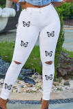 Weiße, modische, lässige, zerrissene, schmale Denim-Jeans mit hoher Taille und Schmetterlingsdruck