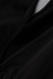 Zwarte sexy badmode met patchworkprint