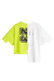 Gelbe, lässige Patchwork-T-Shirts mit asymmetrischem O-Ausschnitt und Straßendruck