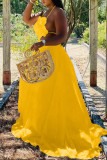 黄色のセクシーなソリッドパッチワーク背中の開いたフラウンスホルターロングドレスドレス