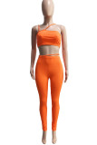 Tangerine Red Sexy Sportswear Solid Patchwork Spaghetti Strap Sleeveless Two Pieces