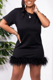 Zwarte mode casual effen patchwork veren O-hals rechte jurken