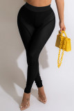 Pantaloni skinny a vita alta a vita alta trasparenti con patchwork solido nero alla moda