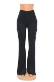 Calças pretas moda casual sólida vazada com fenda e cintura alta