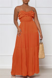 オレンジ色のファッションセクシーなソリッドパッチワーク背中の開いたスパゲッティストラップロングドレス
