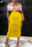 黄色のセクシーなソリッドホローアウトパッチワークオフショルダーペンシルスカートドレス