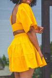 Gele mode casual effen uitgeholde rugloze jurk met vierkante kraag en korte mouwen