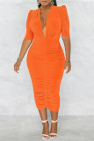 オレンジファッションカジュアルソリッドフォールドVネックワンステップスカートドレス