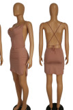 Brownness Sexy Solid Bandage Patchwork Backless Slit Asymmetrical Spaghetti Strap One Step Skirt Dresses