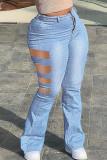 Blauwe mode casual effen gescheurde uitgeholde hoge taille skinny denim jeans