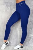 Blaue, schmale Patchwork-Hose mit Bleistiftpositionierungsdruck und hoher Taille