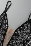 Monos moda sexy patchwork perforación en caliente transparente sin espalda correa de espagueti flaco negro