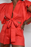 オレンジファッションセクシーカジュアルソリッド包帯パッチワーク背中の開いたVネック半袖XNUMXピース