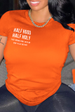 オレンジファッションストリートプリントパッチワークレターOネックTシャツ